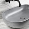 Vasque ovale à poser 65x35 cm design OVAL de Gravelli, béton poli gris clair_D1