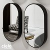 Armoire miroir murale ovale 90x50 cm, I CATINI de Ceramica Cielo, structure bois laqué noir 